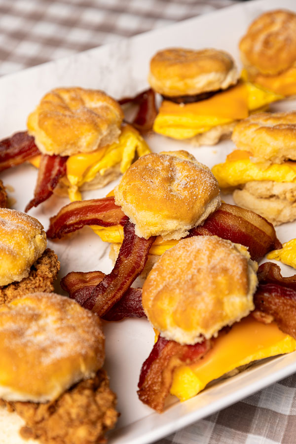 Chicken Biscuits, Bacon Egg and Cheese Biscuits, and Sausage Egg and Cheese Biscuits on a Plate