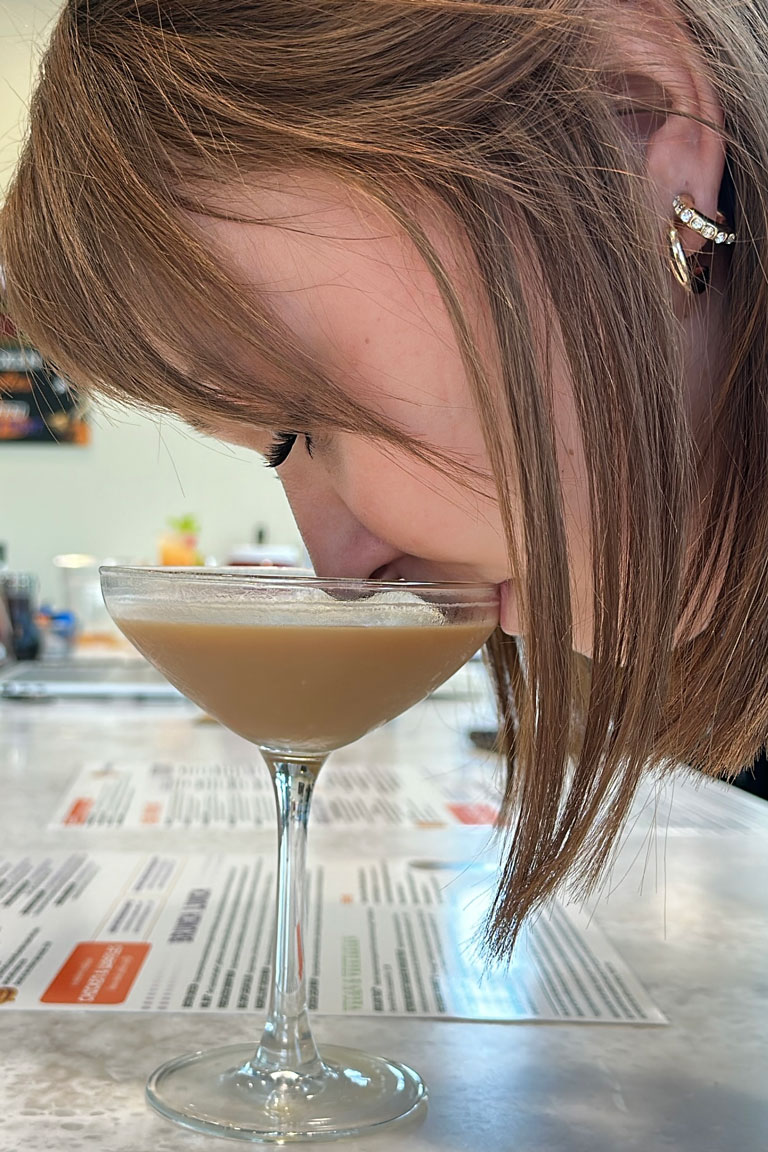 Girl Sipping an Espresso Martini